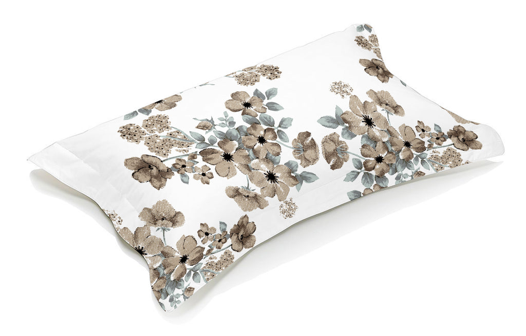 Floral-patterned pillow in brown and white color