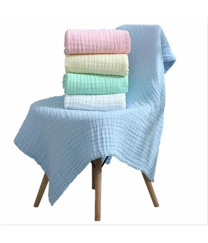 Stack of colorful textured baby bath towels