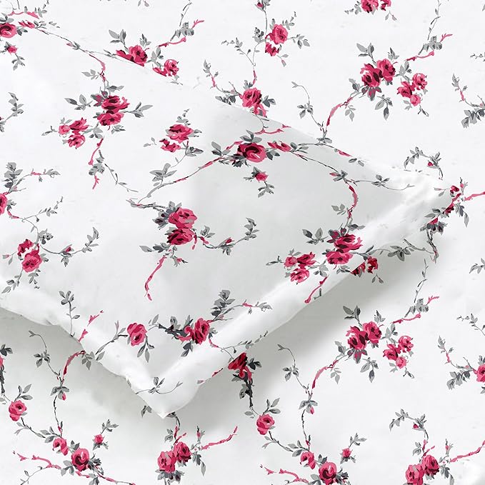 Floral patterned fabric with pink roses on bedsheet