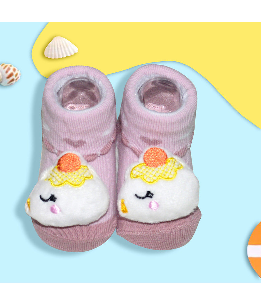 Pair of baby pink socks with animal design