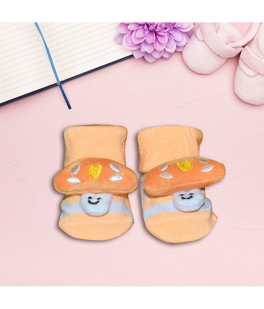 Pair of cartoon mushroom socks for baby