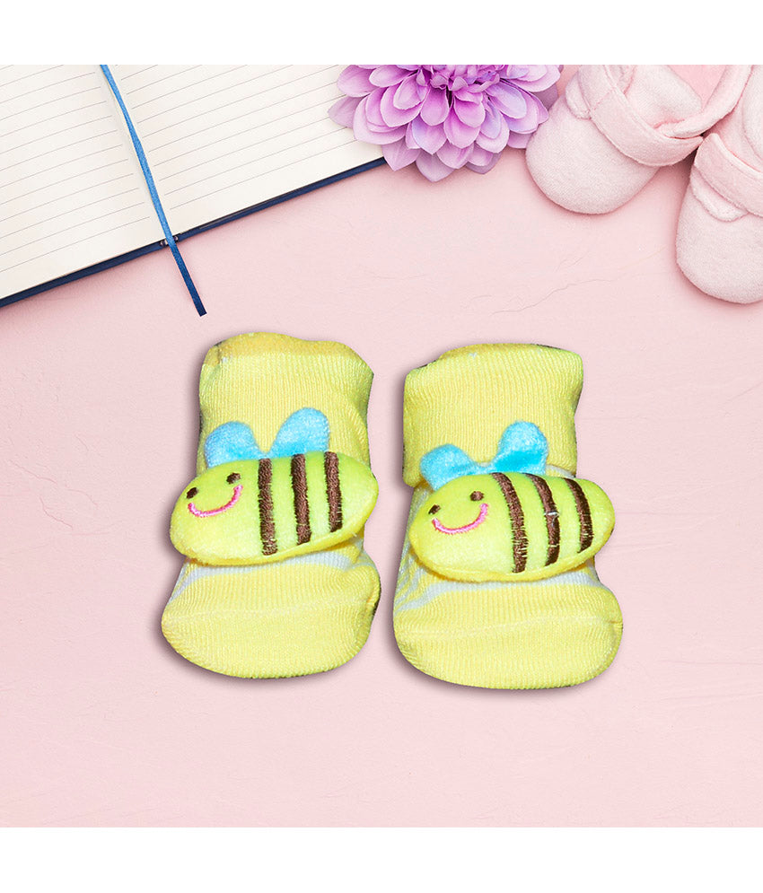 Yellow baby socks with bee design